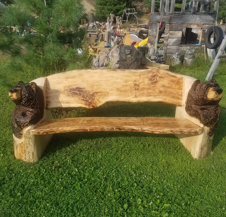 Bear bench by Kerr Chainsaw Carving